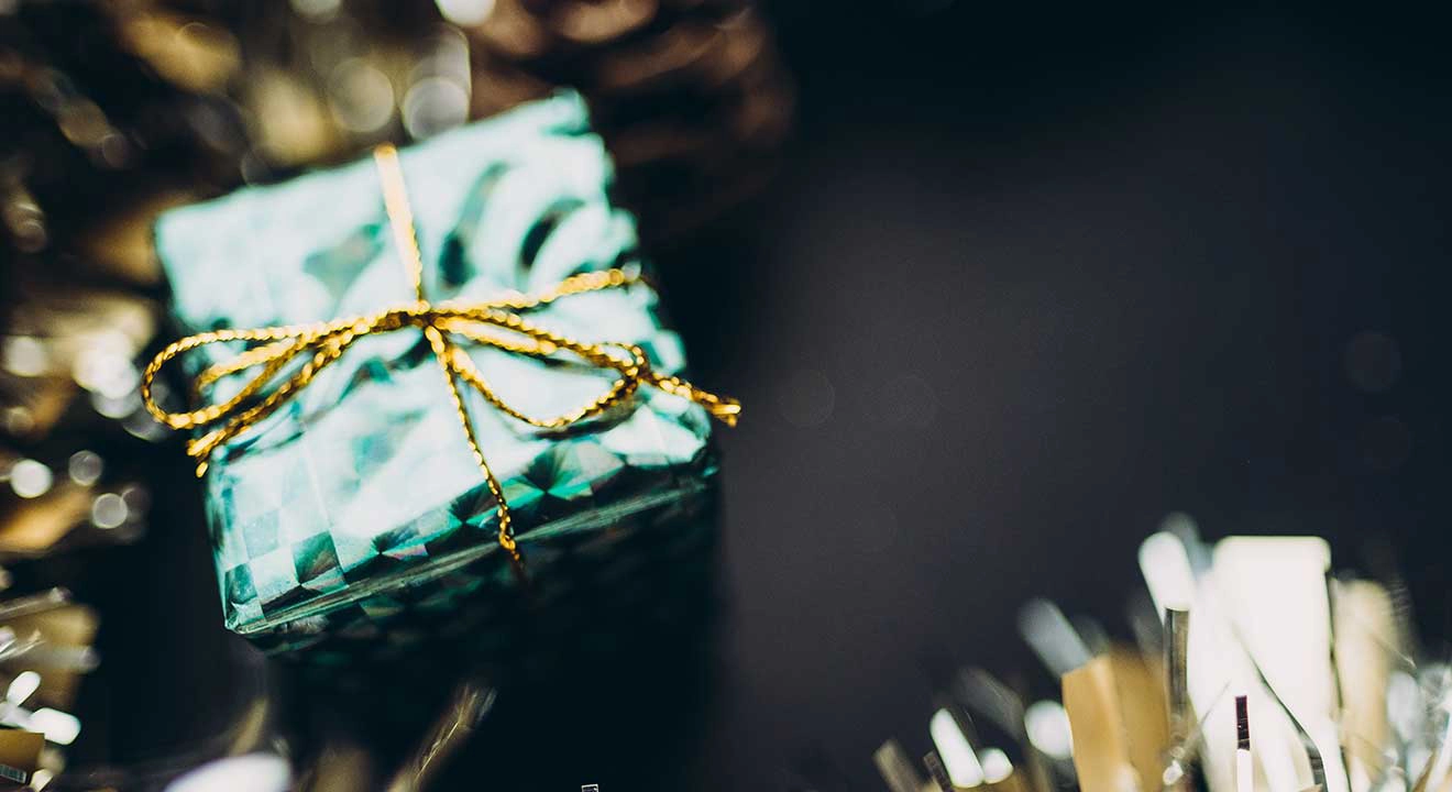 A small Christmas package tied with a string