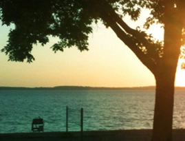 Sun setting over a lake