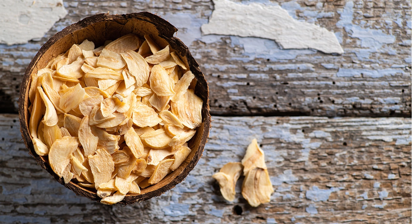 A bucket full of manna on an old worn table