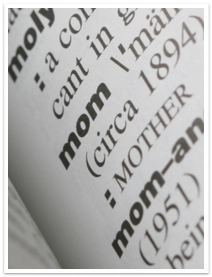 Closeup of the word mom in a dictionary