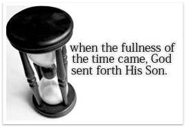 An hour glass viewed from above with text on the right side