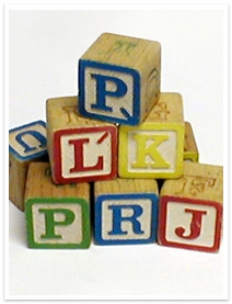 Wooden children's building blocks stacked as a pyramid